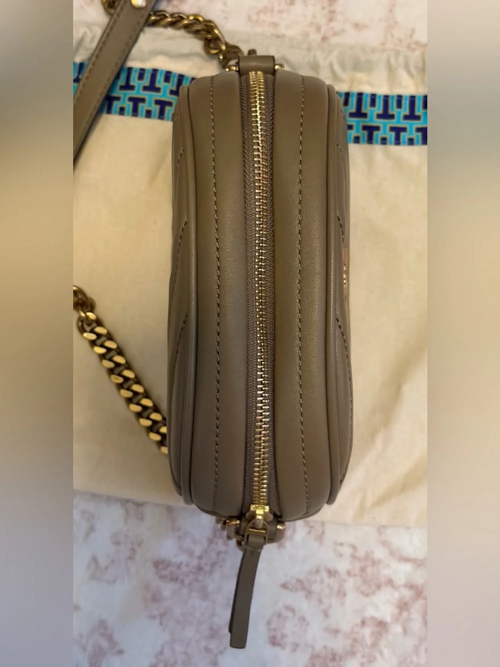 Tory Burch Kira Chevron Small Camera Bag in the color “Sandpiper”